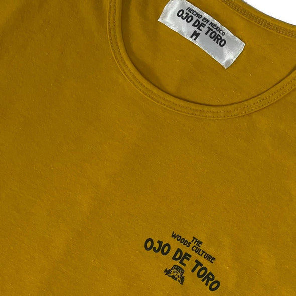 Playera The Woods Culture Tee | Mostaza Ojo de Toro